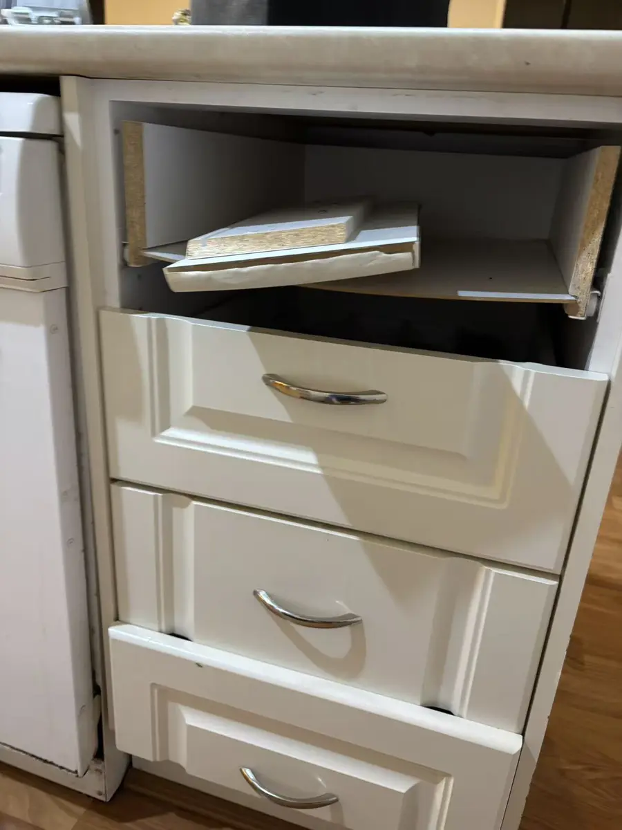Kitchen drawer unit with loose fronts and internal panels before repair