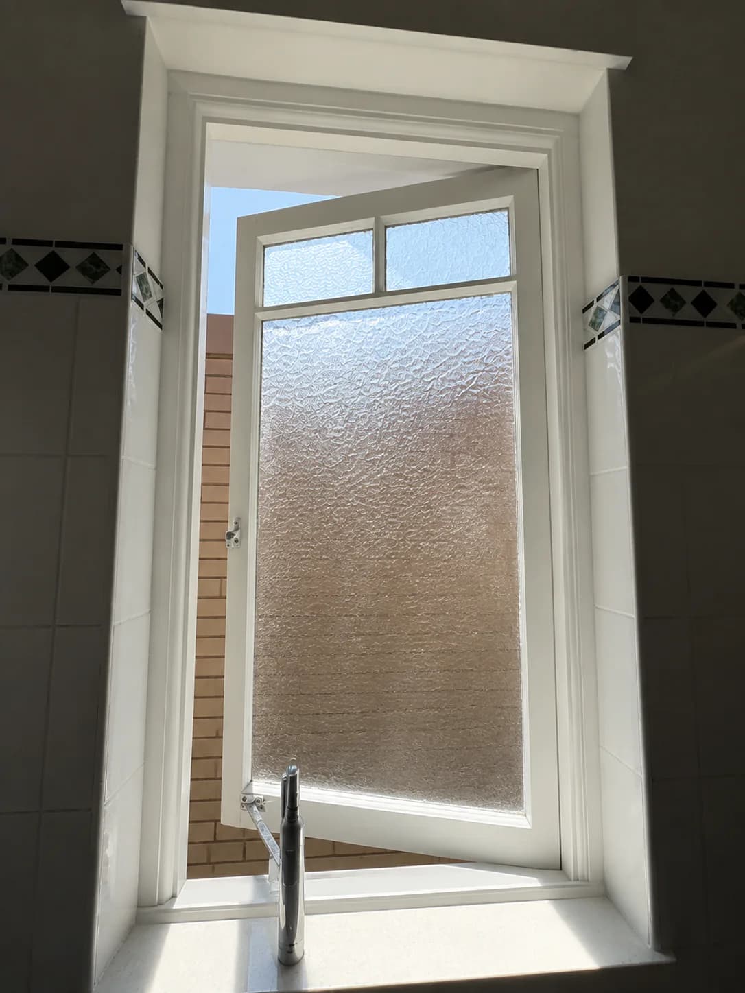 Timber awning window after the sash, frame, hardware and privacy glass repair